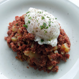 Creswick Farm's Corned Beef Hash Displayed With An Egg