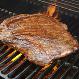 Creswick Farm's Large Flank Steak Cooking On A Grill